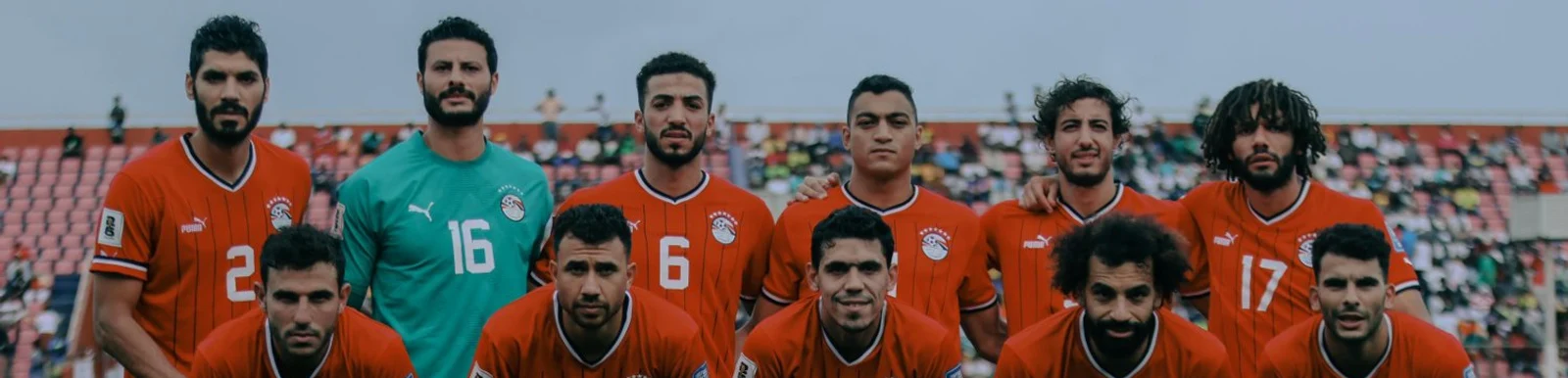 The Egypt national football team line up before a 2026 World Cup game, with Mohamed Salah in the front row. An official photo from the Egypt national team account.